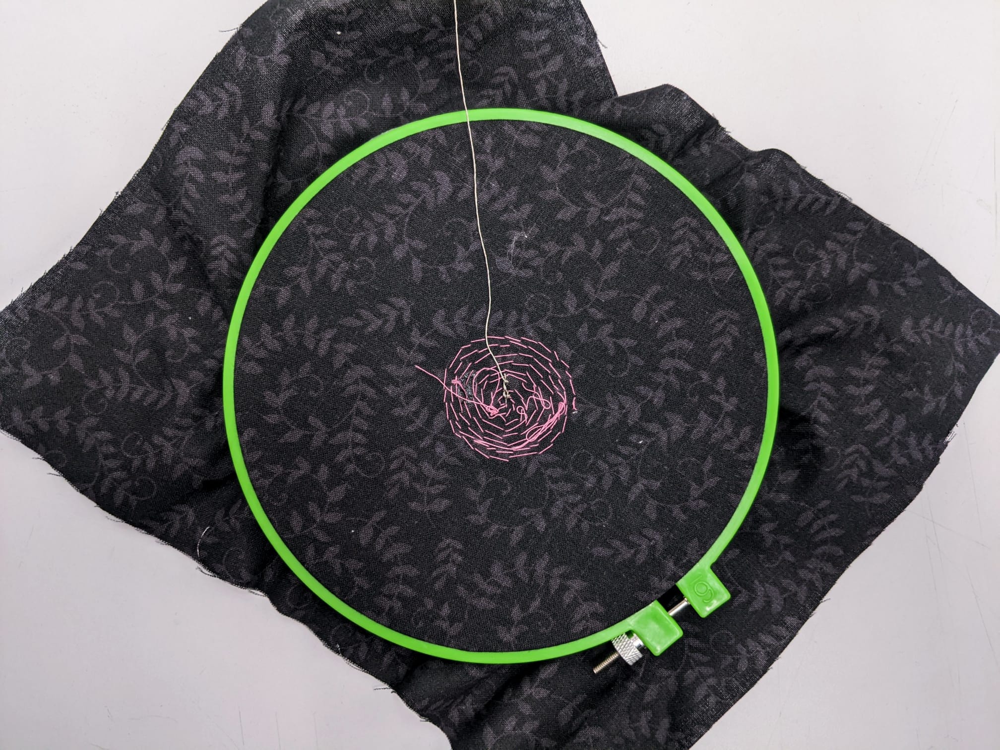 messy scenes behind the front view, pink string everywhere